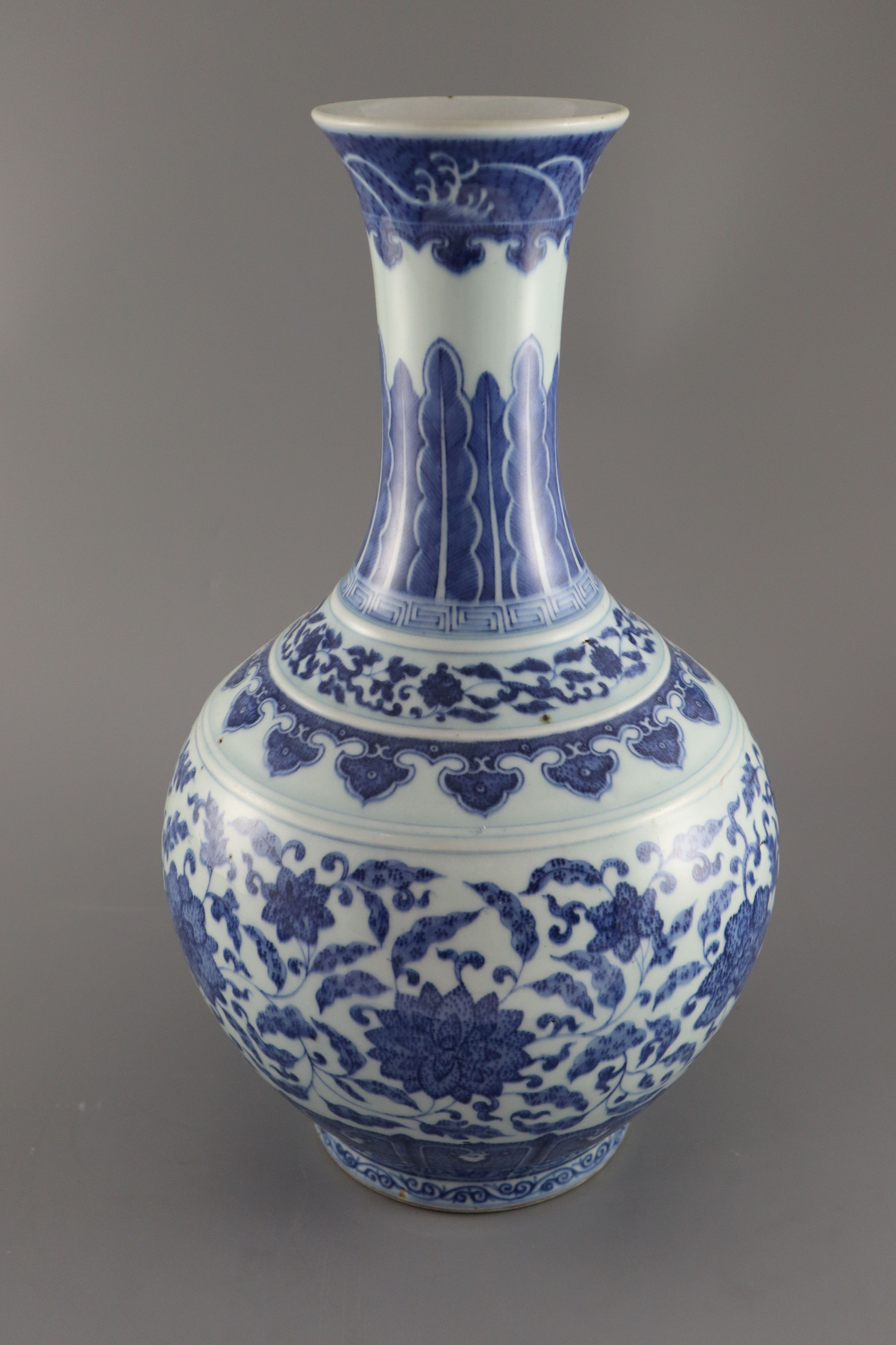 A Chinese blue and white Ming style bottle vase, Qianlong six character mark but later, 41.5cm high